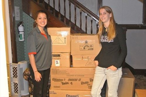 Student Shannon Rosetti and Crossroads Counselor Advocate Brittany Holt prepare to inventory the DuBois Dollar Tree donation.
