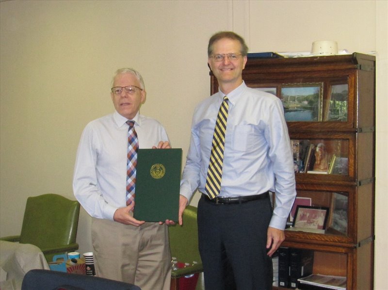 Robert A. Cardamone is presented a Senate Citation by Senator Scott E. Hutchinson for his distinguished service to Community Action, Inc., the community, and the Commonwealth.  (Missing from the photo is Senator Joseph Scarnati, III)